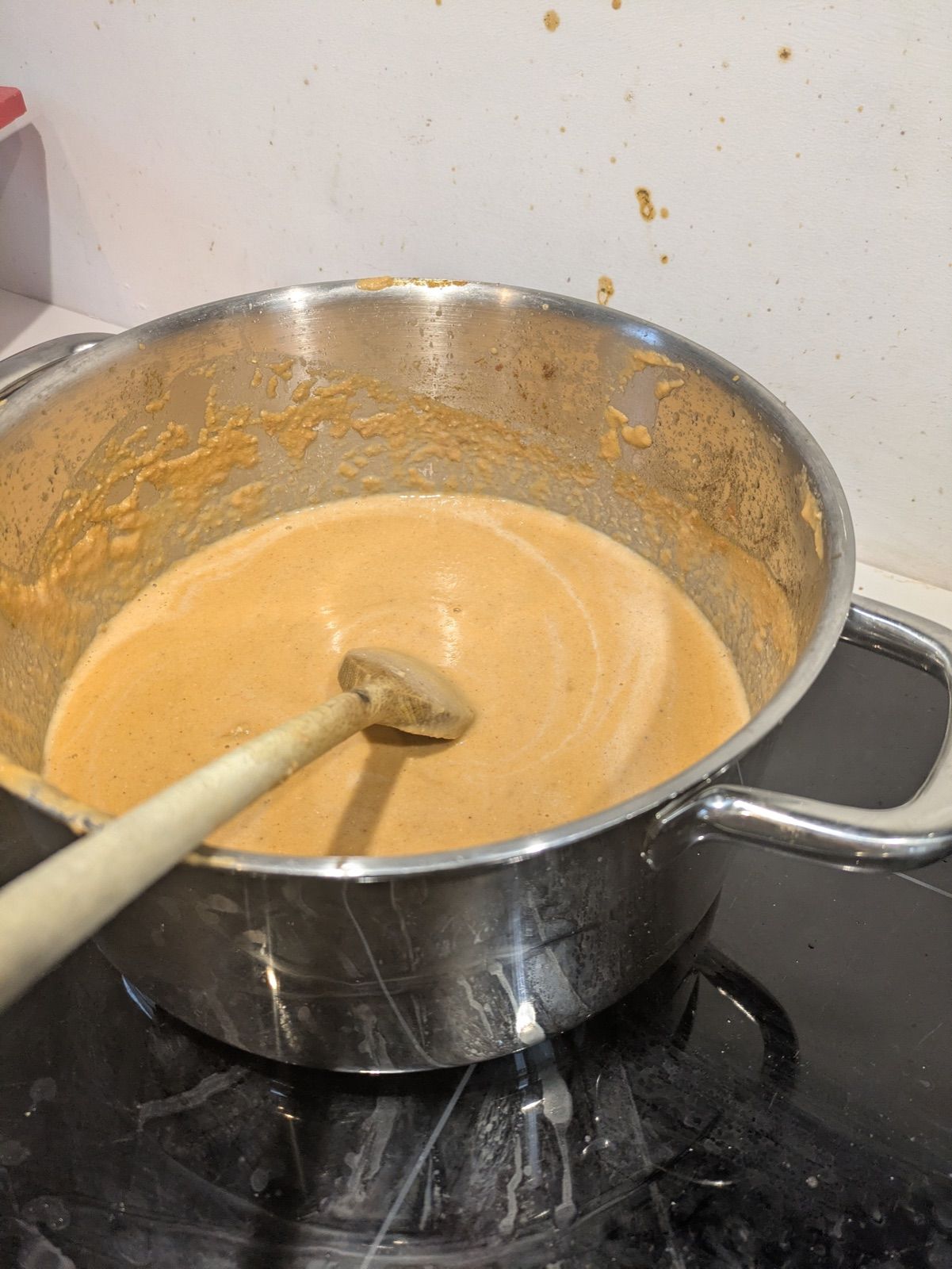 A pot of freshly blended curry base on the hob